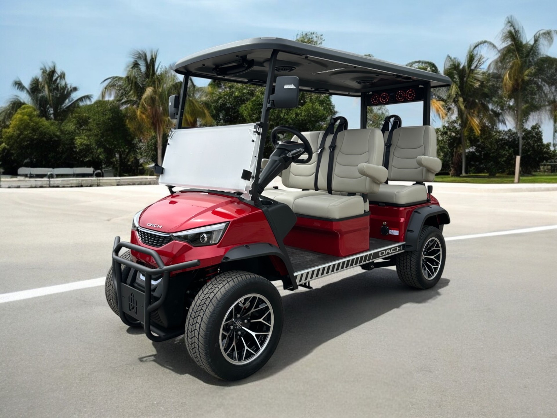 Red golf cart with beige interior seating